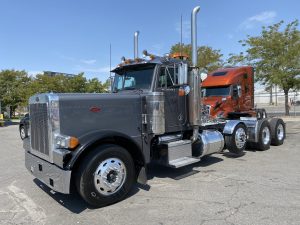 2002 PETE 379 DAY CAB TRANSPORT TRUCK