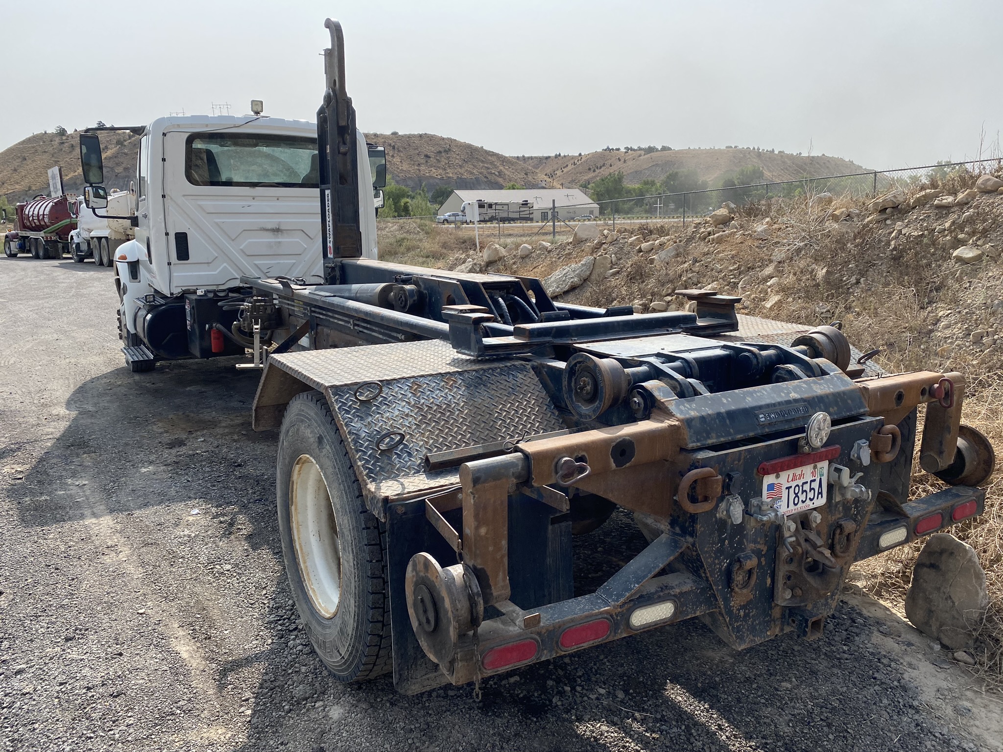 4400 HOOK DUMPSTER TRUCK Dogface Heavy Equipment Sales Dogface